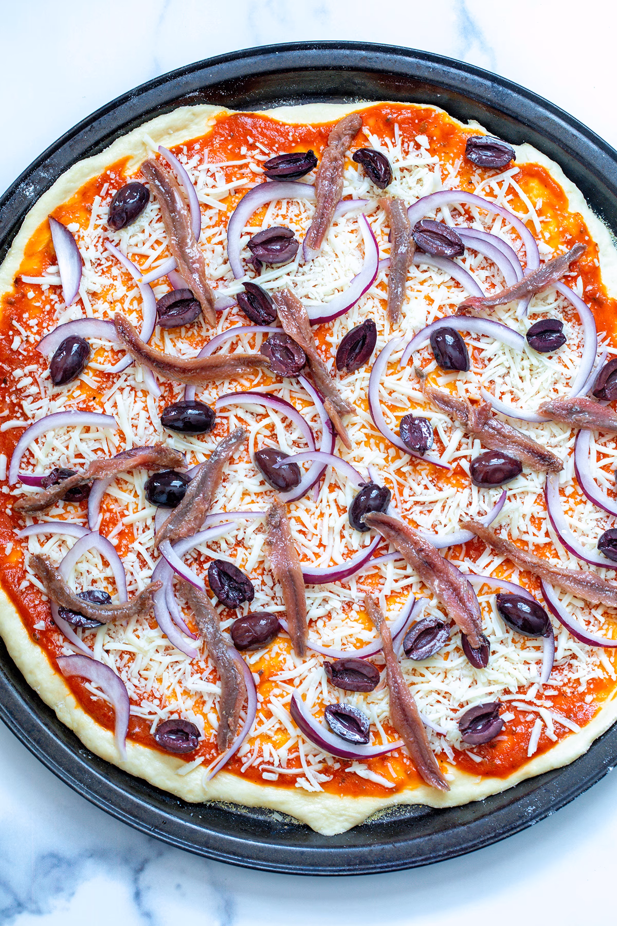 Where did anchovy pizza come from?