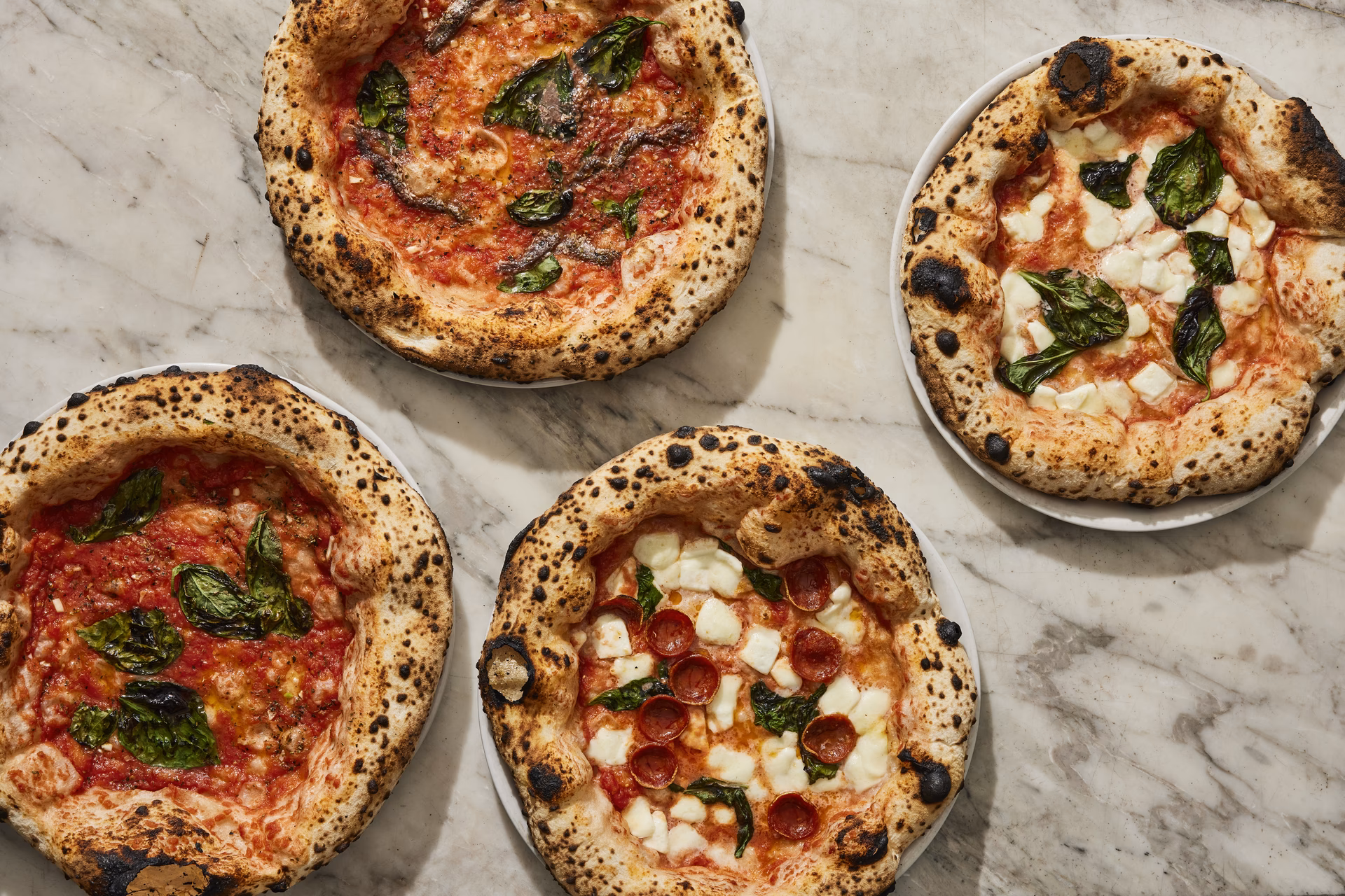What are the different types of pizza in New York City?