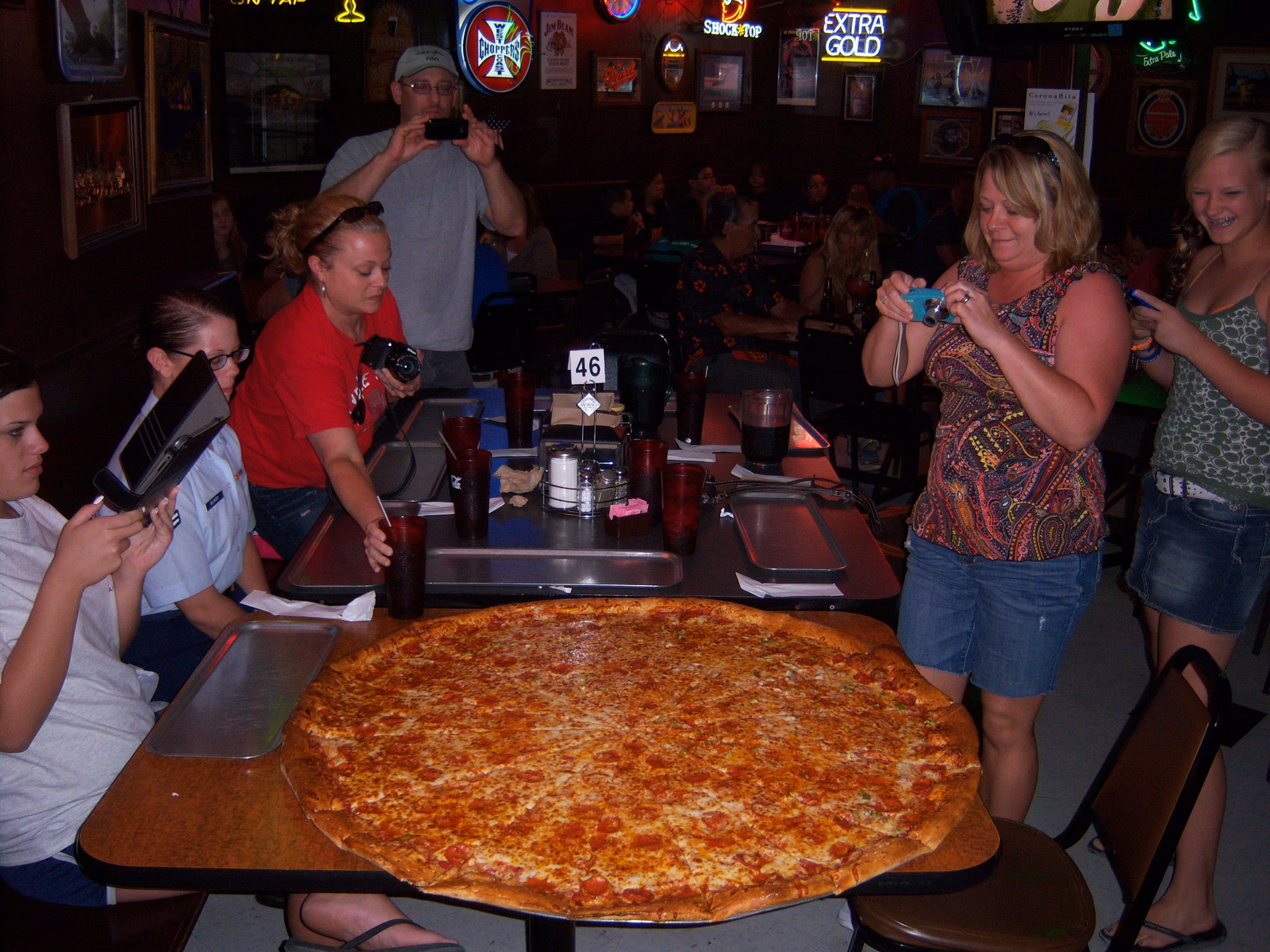 Does Big Lou's Pizza slow smoke their BBQ?