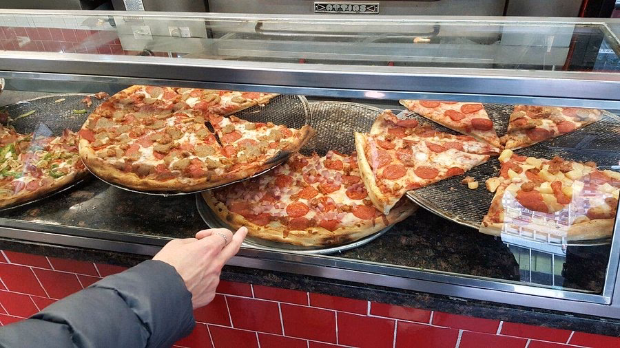 Does 2 Bros pizza serve pizza in New York City?