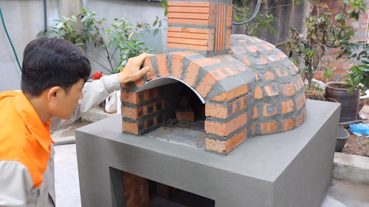 How do you finish a concrete pizza oven?