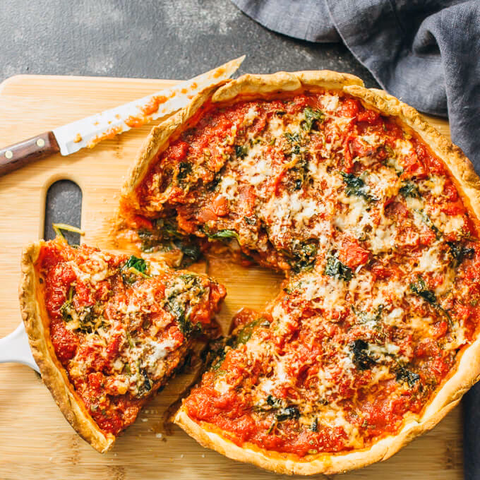 What is a deep dish pizza topped with?