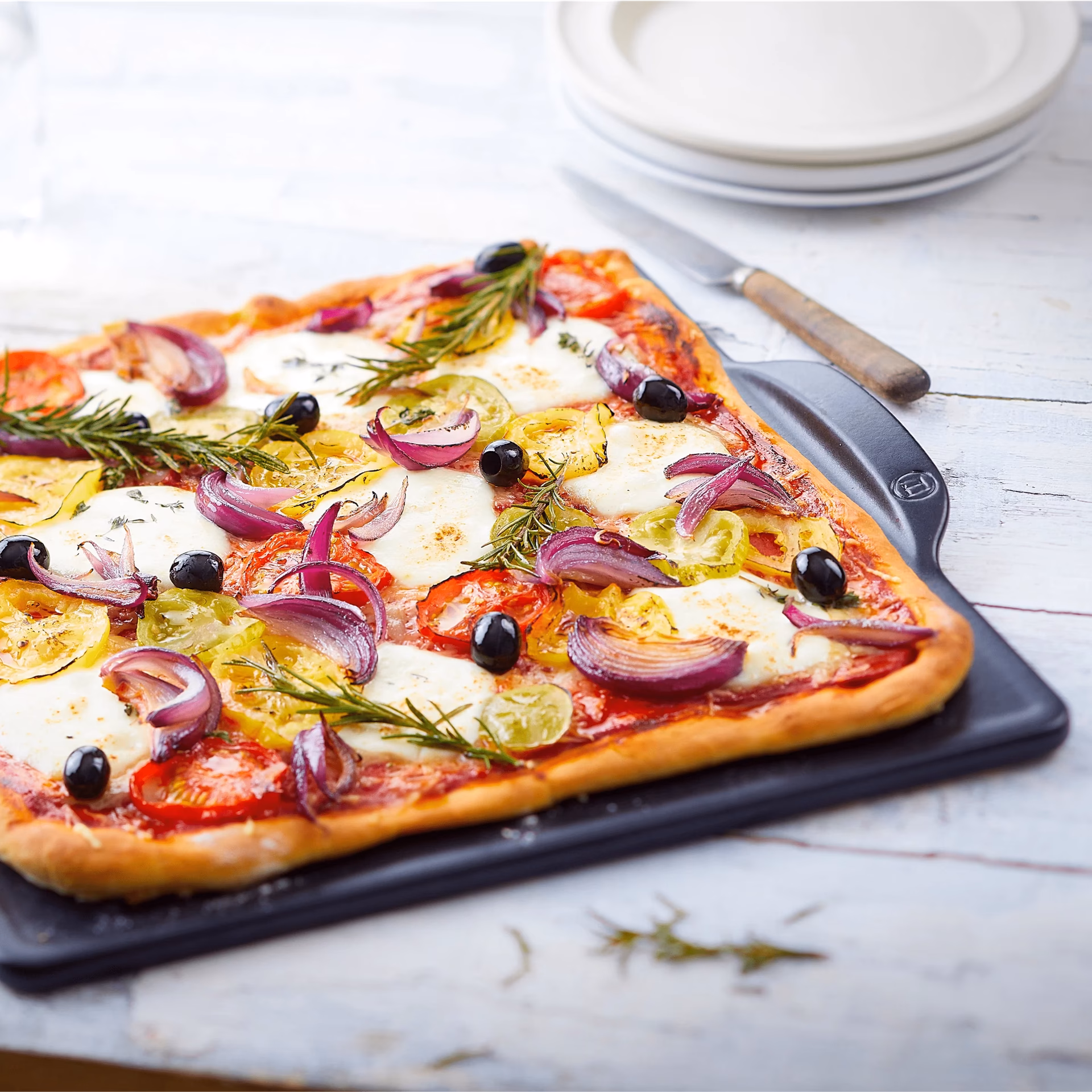 What is the Emile Henry pizza stone made of?