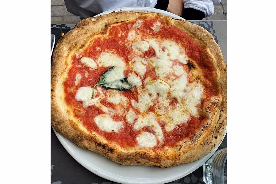 Where did pizza become famous?