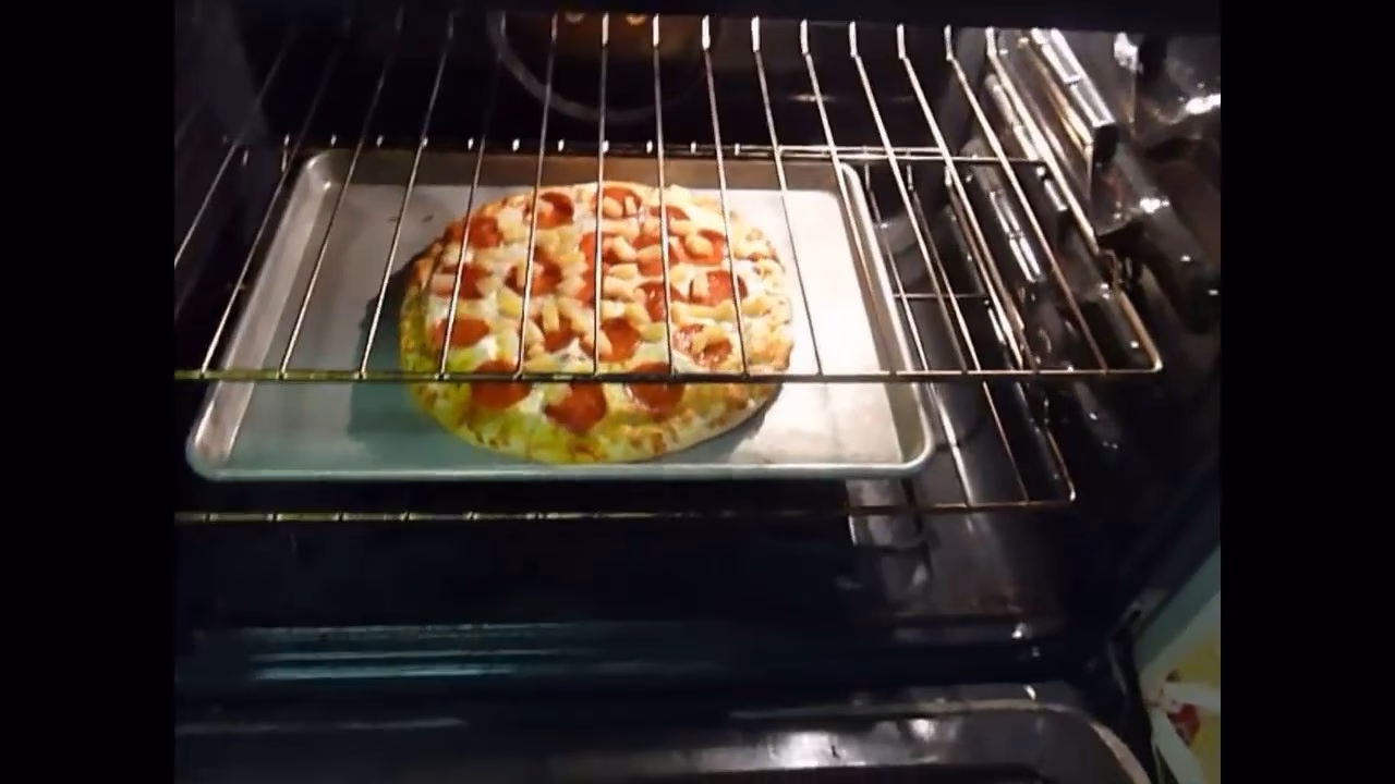 What oven can cook frozen pizza faster?
