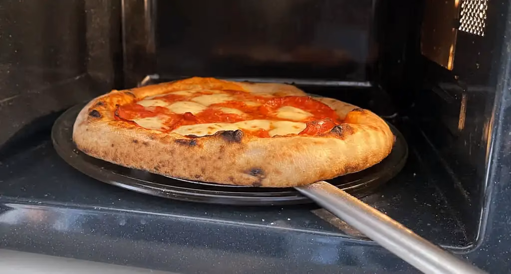 Can you cook frozen pizza in the oven?