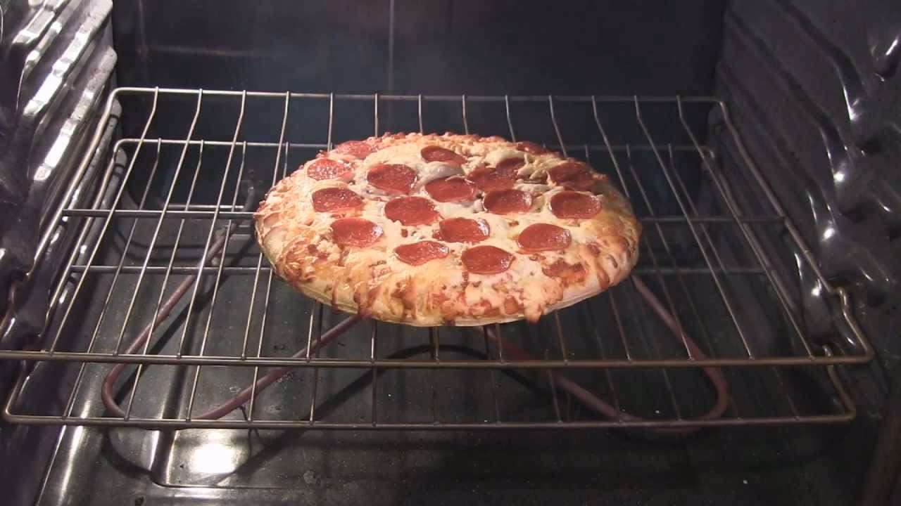 What temperature do you cook a frozen pizza?