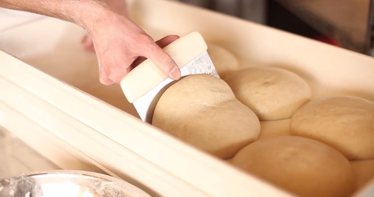 How do you throw a pizza if you are right-handed?