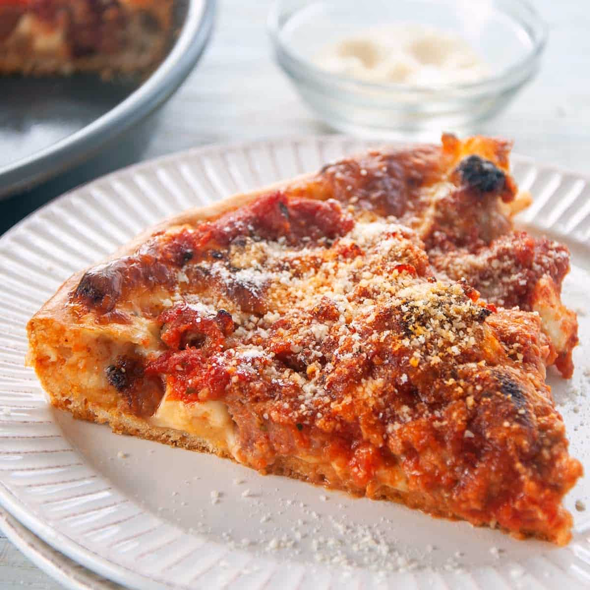 How do you eat Chicago-style pizza?