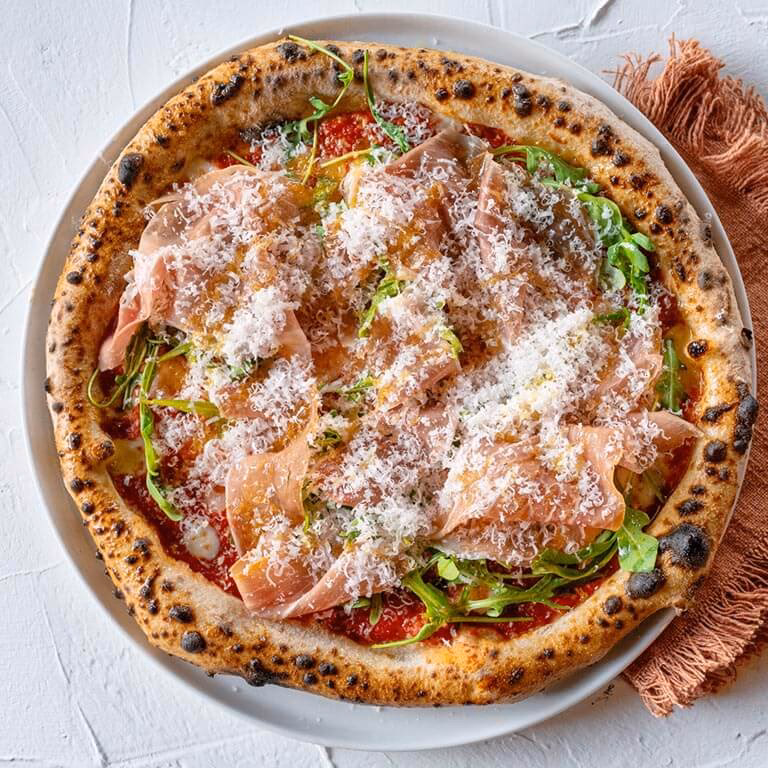 How do you make a good prosciutto pizza?