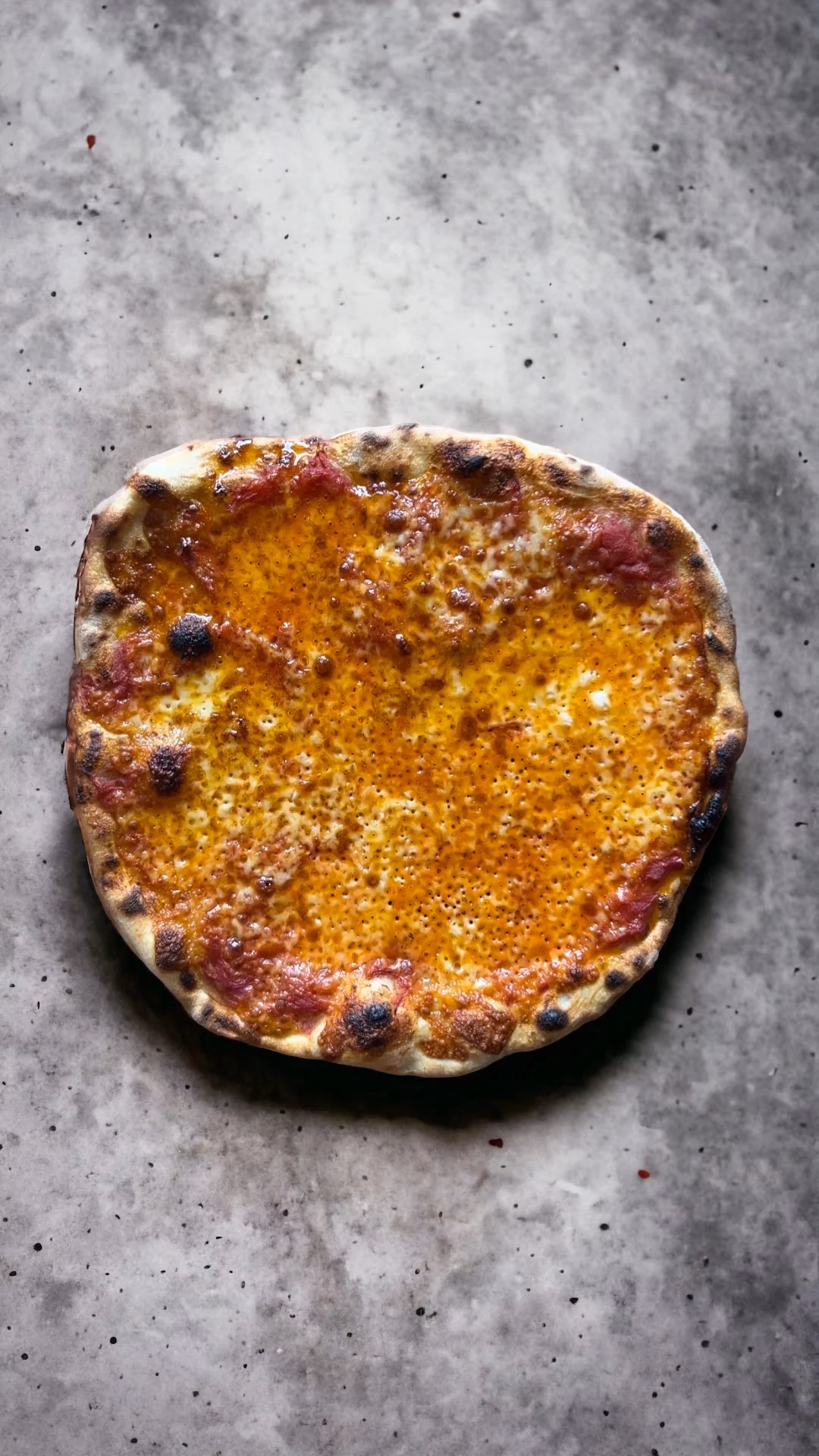 How do you make a crispy pizza base?