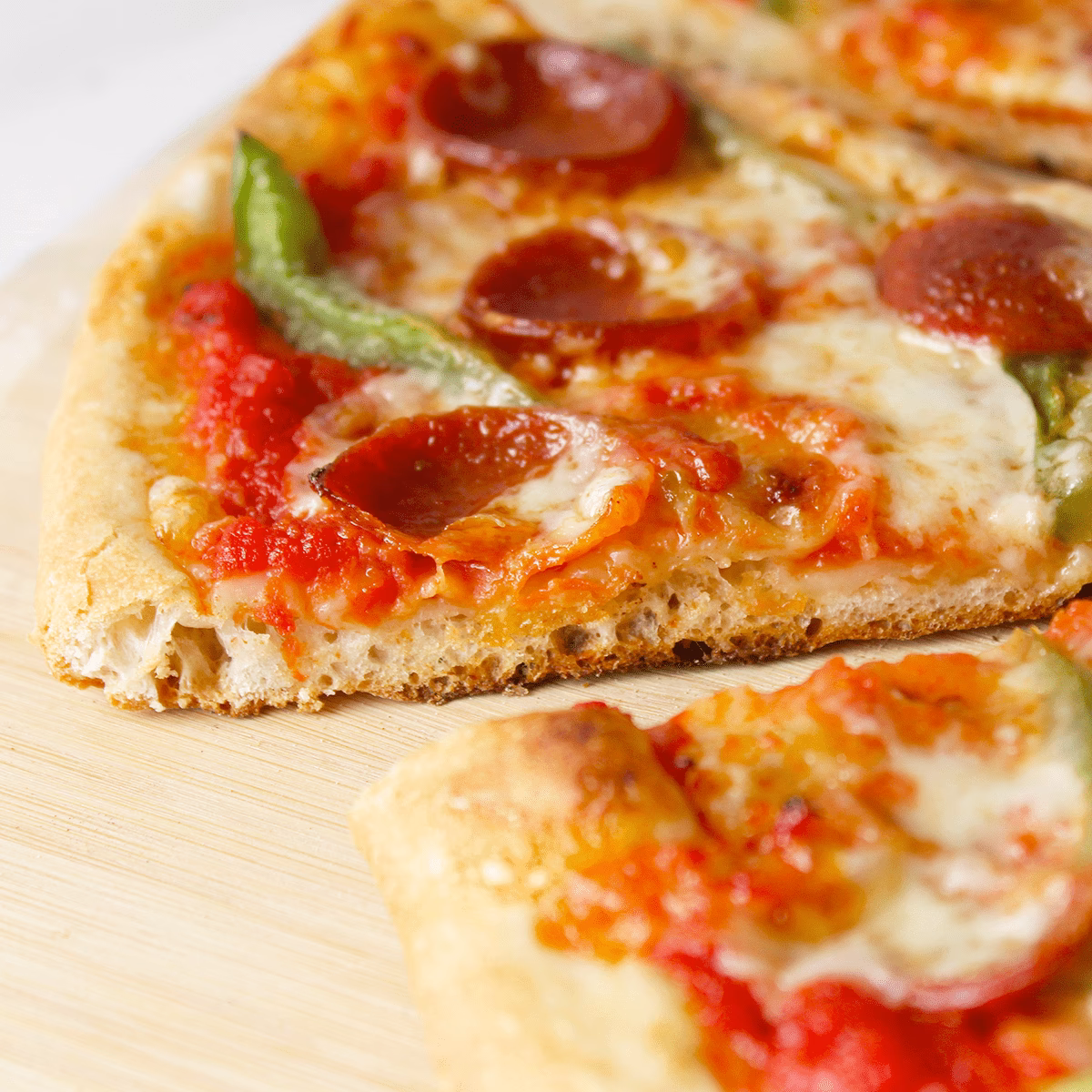 How do you bake a pizza crust?