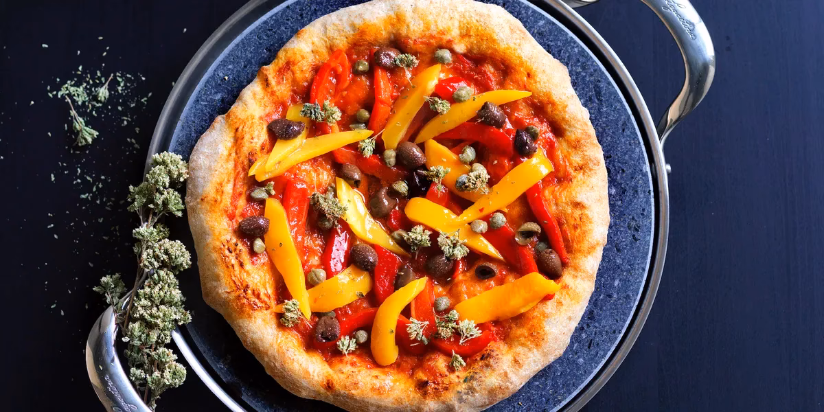 Can you put a frozen pizza on a pizza stone?
