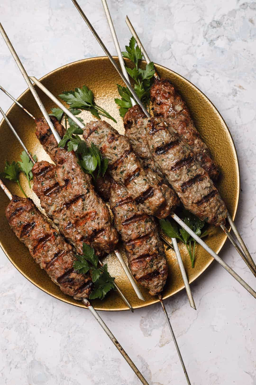 How do you cook a kebab on a grill?