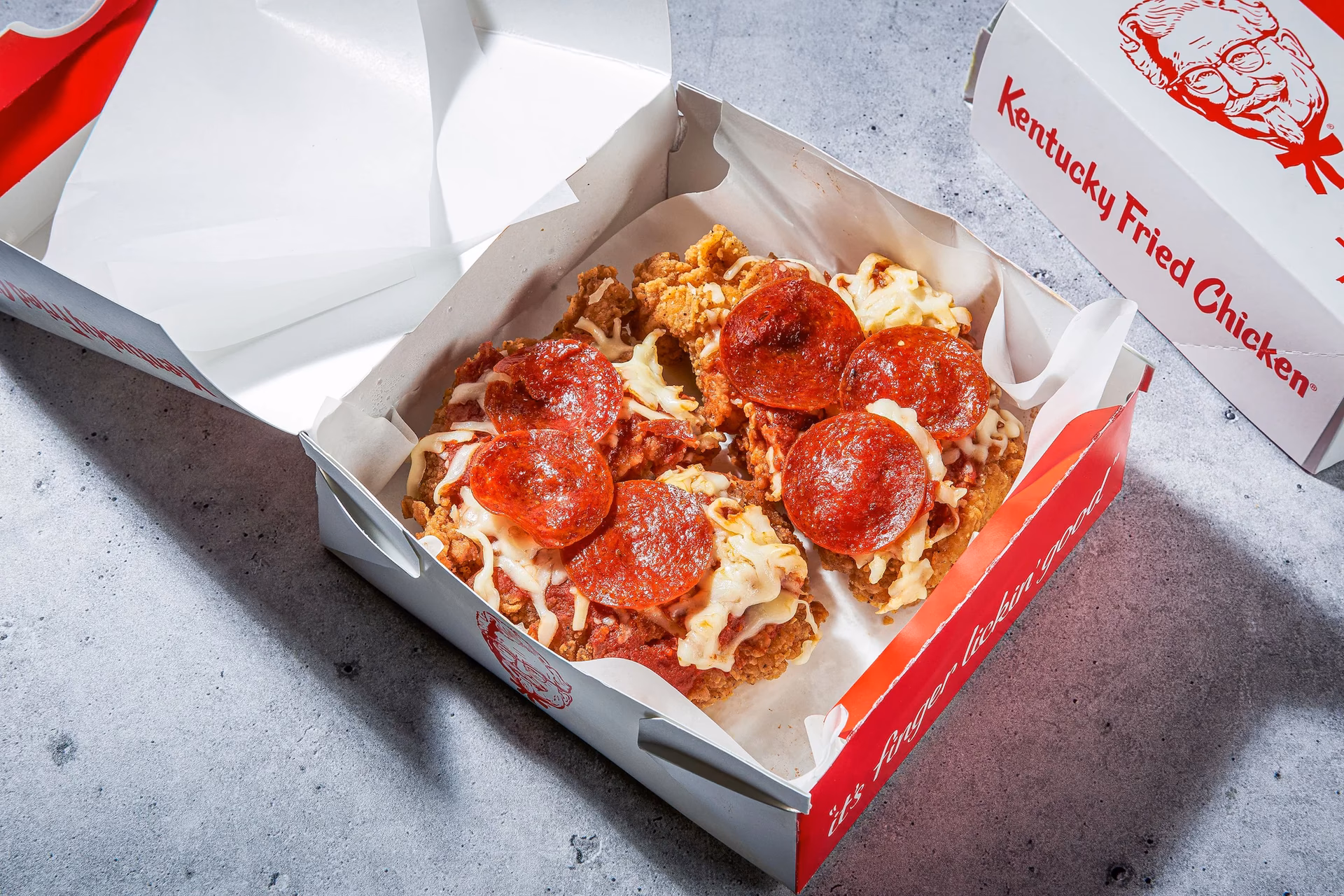 Does KFC sell chicken burgers in South Africa?