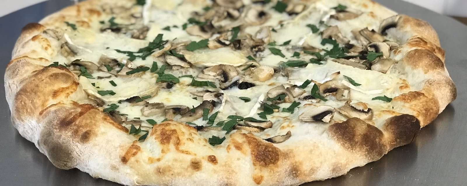 Does Laszlo's Bistro serve homemade pizza?
