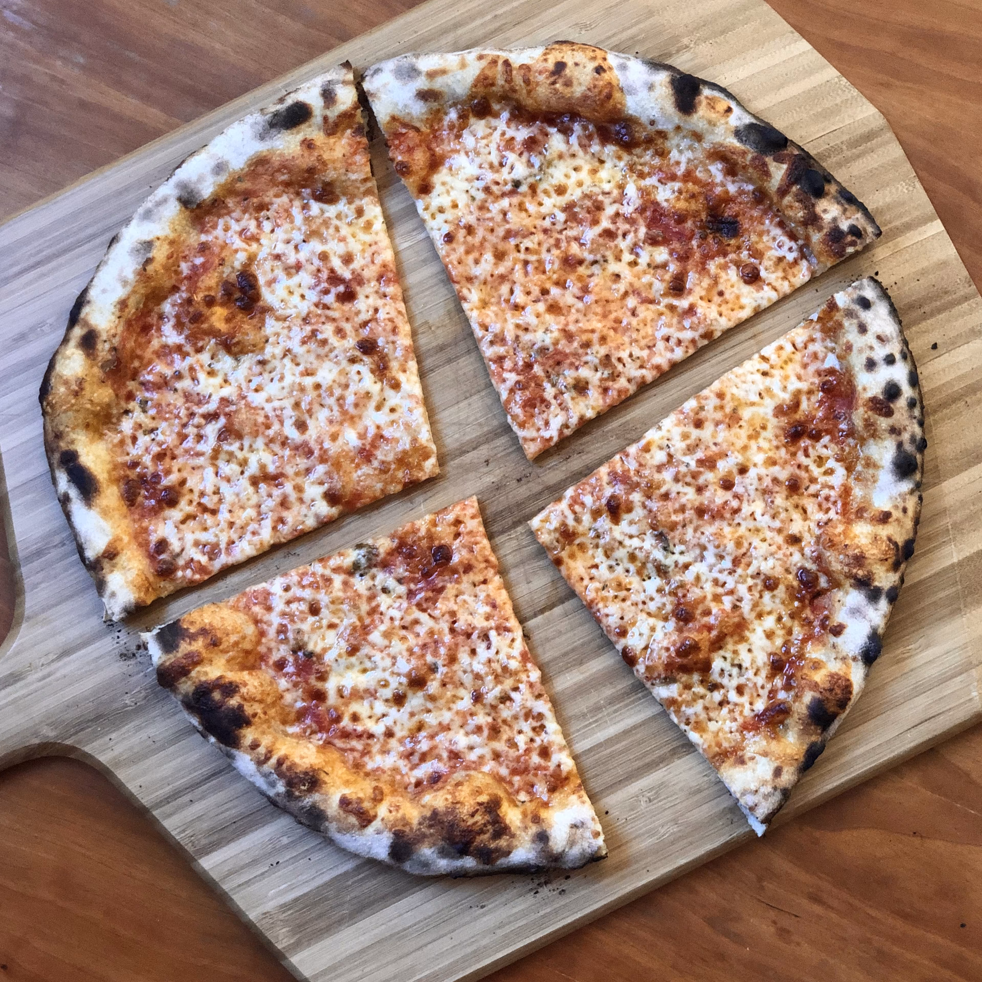 How do you make a New York-style pizza crust?