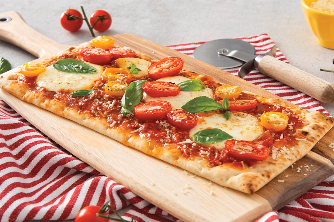 How do you make a Margherita flatbread?