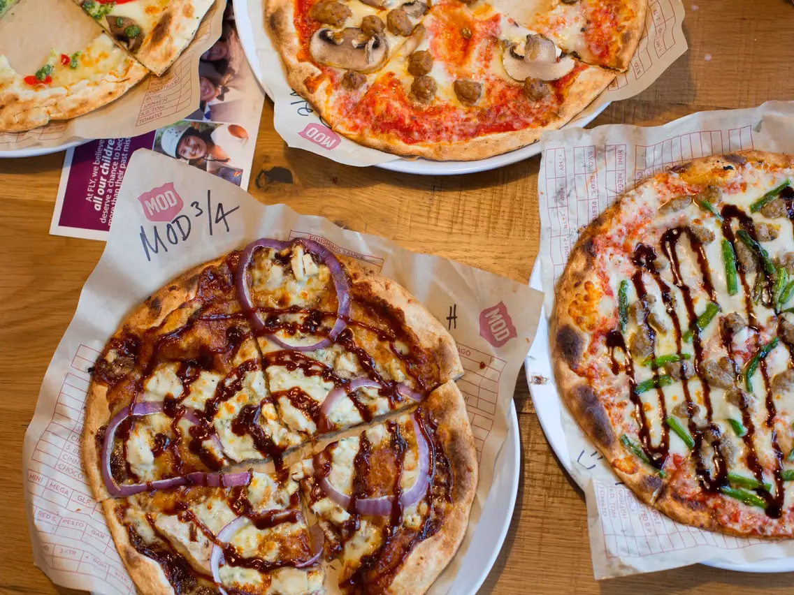 How does MOD Pizza make their pizza delicious?