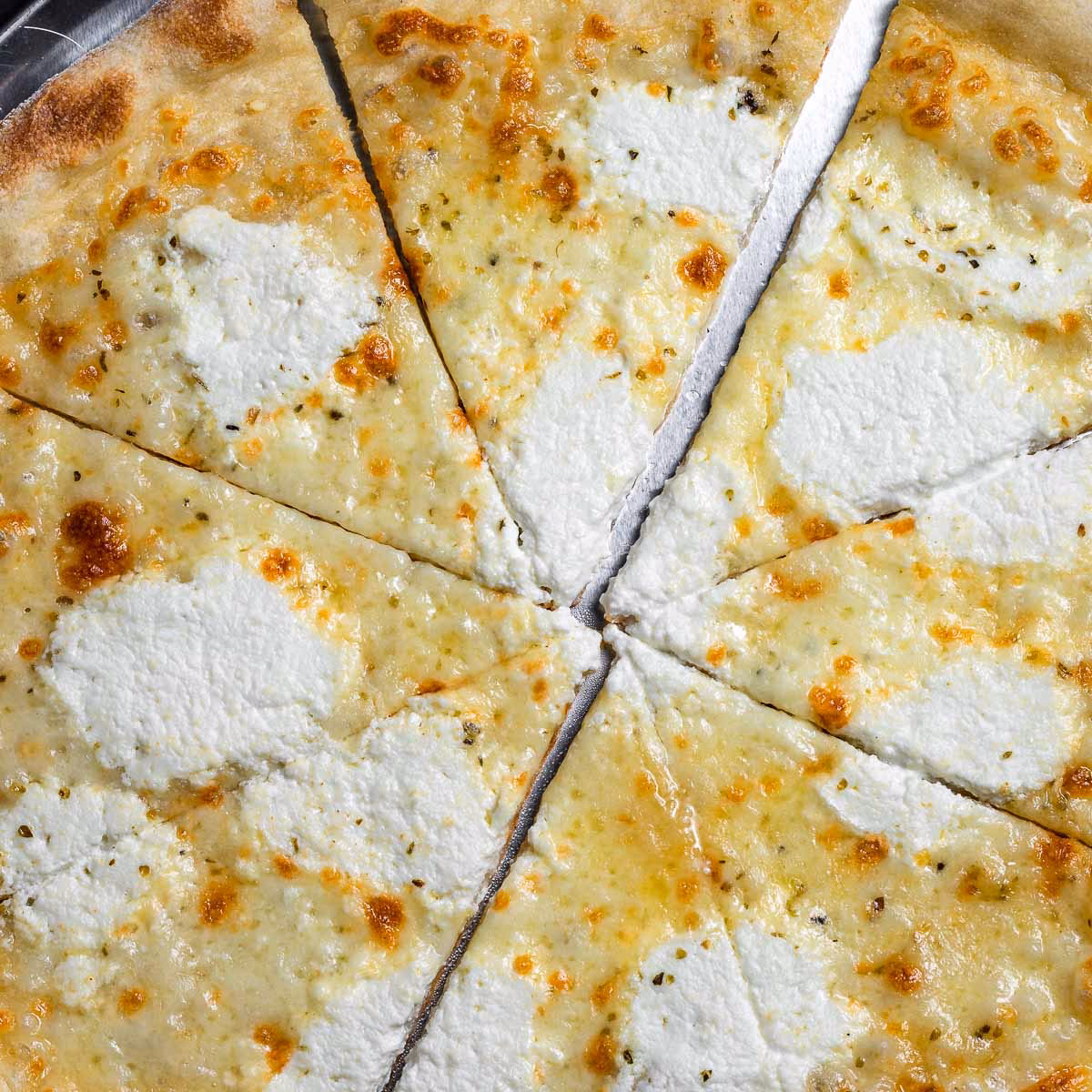 What is New York white pizza made of?