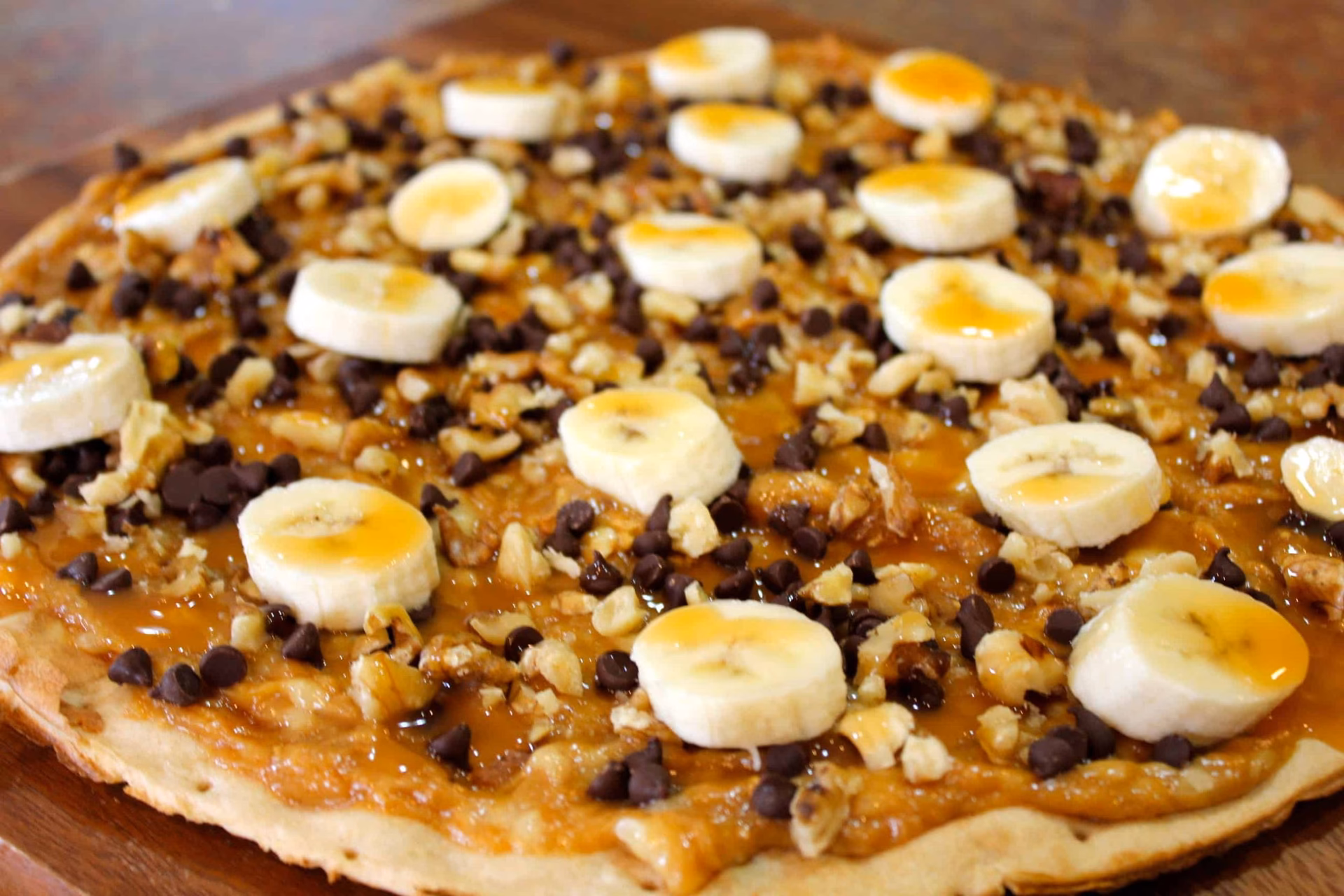 How do you make a peanut butter cookie pizza?