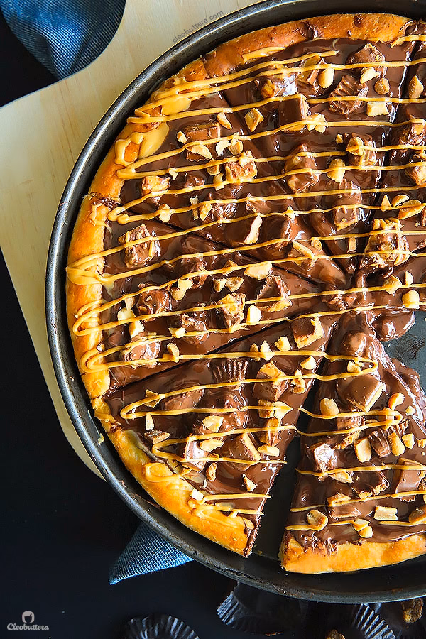 How do you make a peanut butter cookie pizza?