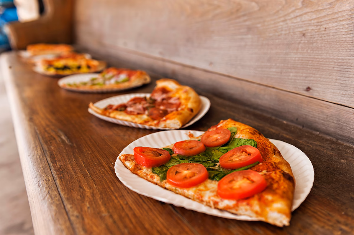 What time does corolla Pizza & Deli open?