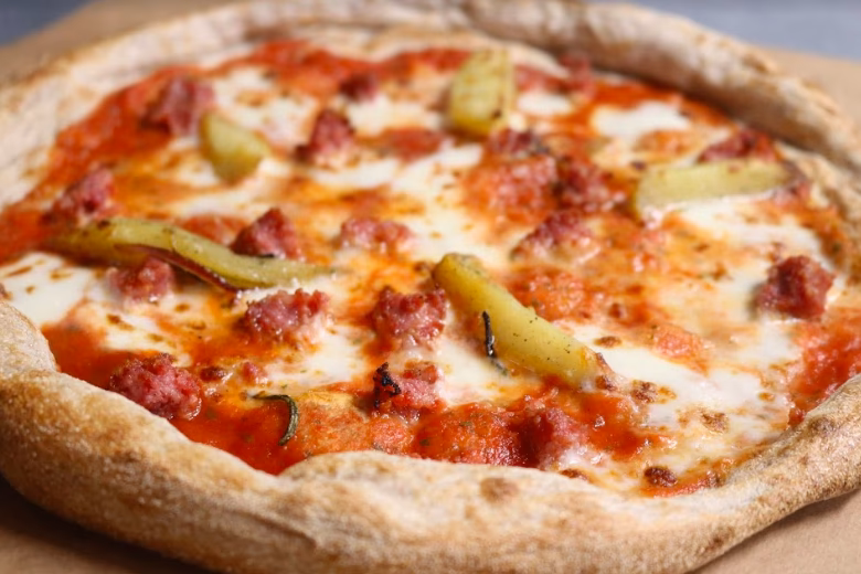 What is the difference between matzah pizza and okonomiyaki pizza?