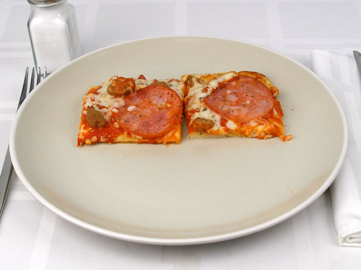 How many calories are in a large Supreme pan pizza?