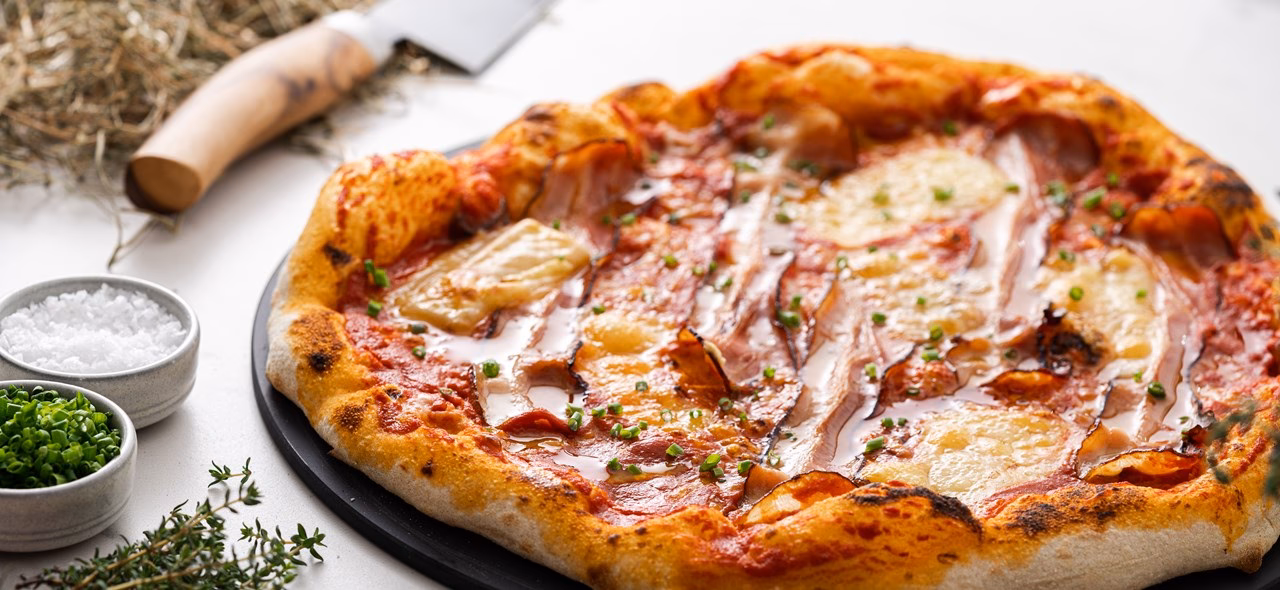 Wie bereite ich eine Pizza zu?