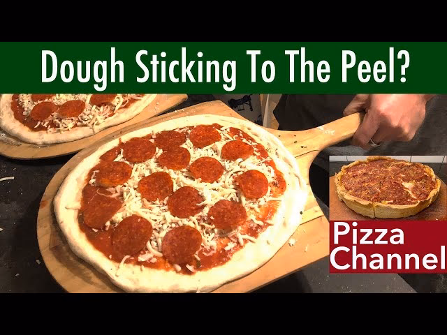 Why is my pizza dough sticking?