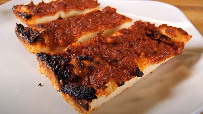 Where do Rhode Island's famous pizza strips come from?