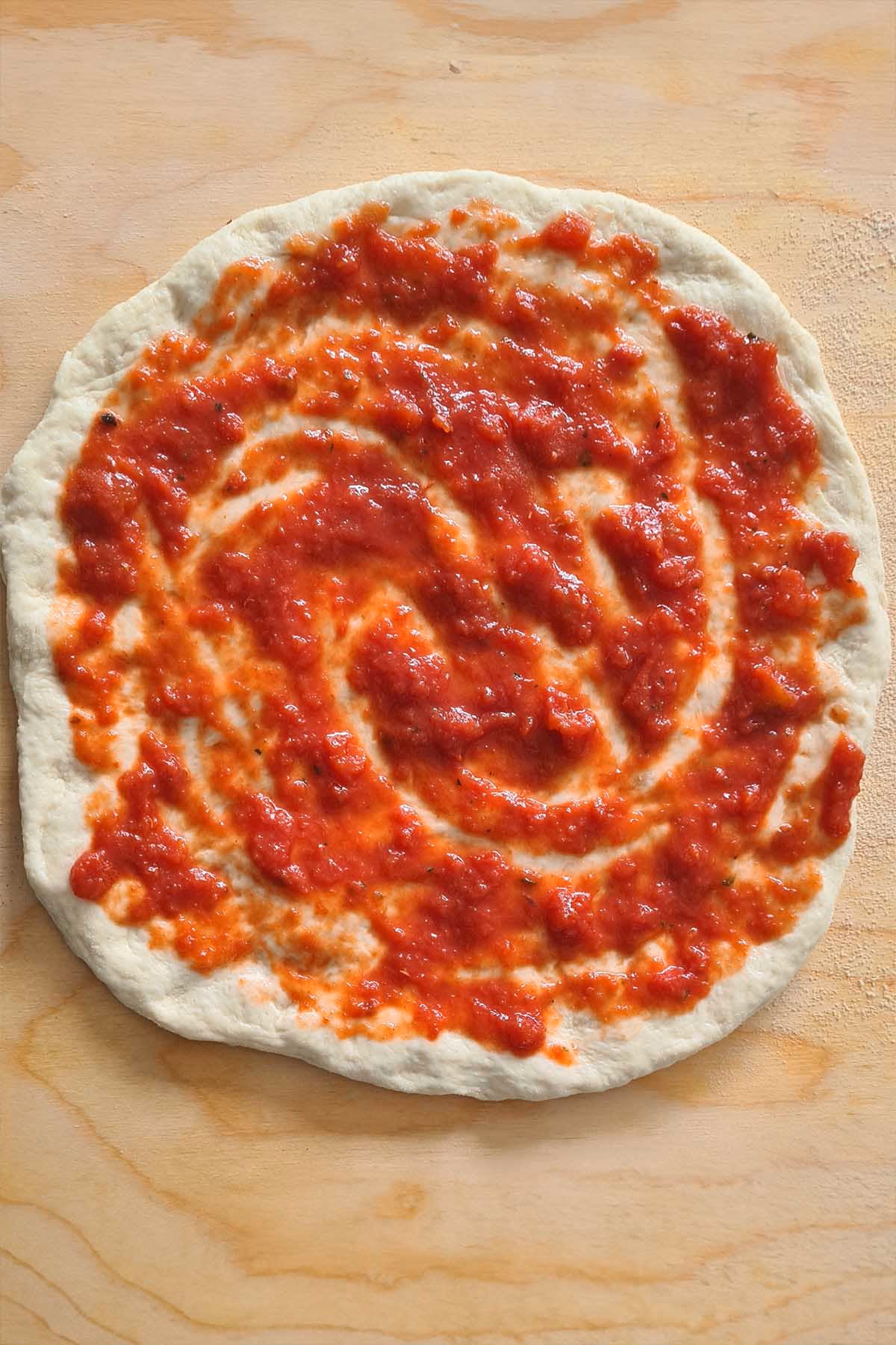 How do you make a pizza with marinara sauce?