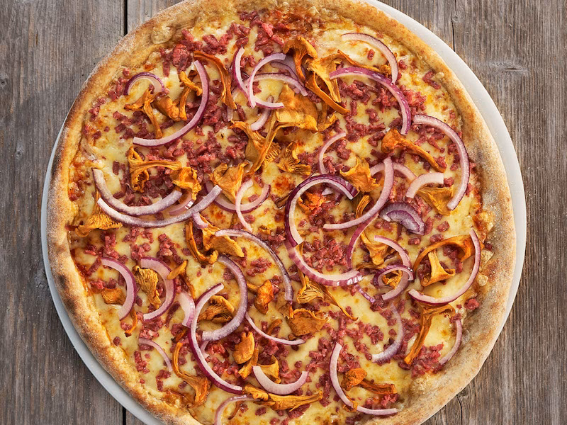 Why did Silvio Berlusconi create a rye pizza?