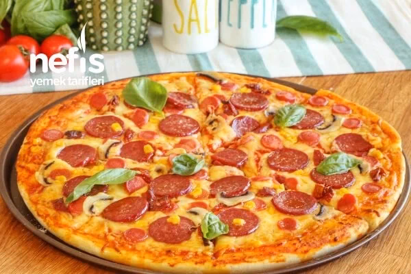 Pizza hamurunun pişirdikten sonra pişirin.?