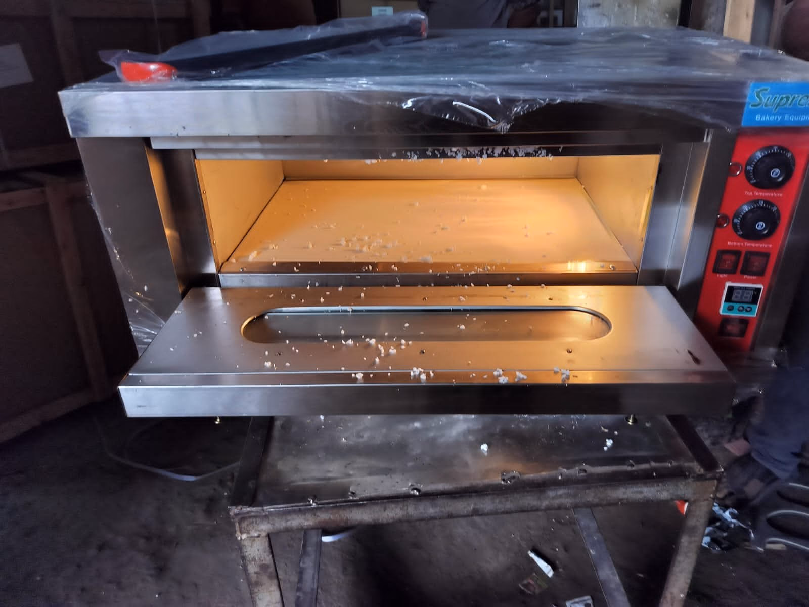 What is a single deck pizza oven?