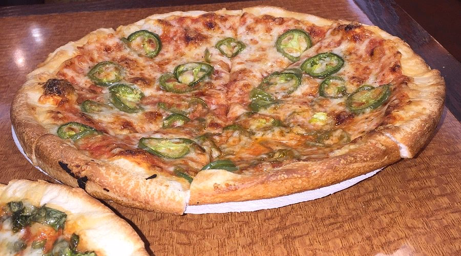 Where is Singas Pizza located?